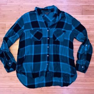 Blue plaid button down shirt.